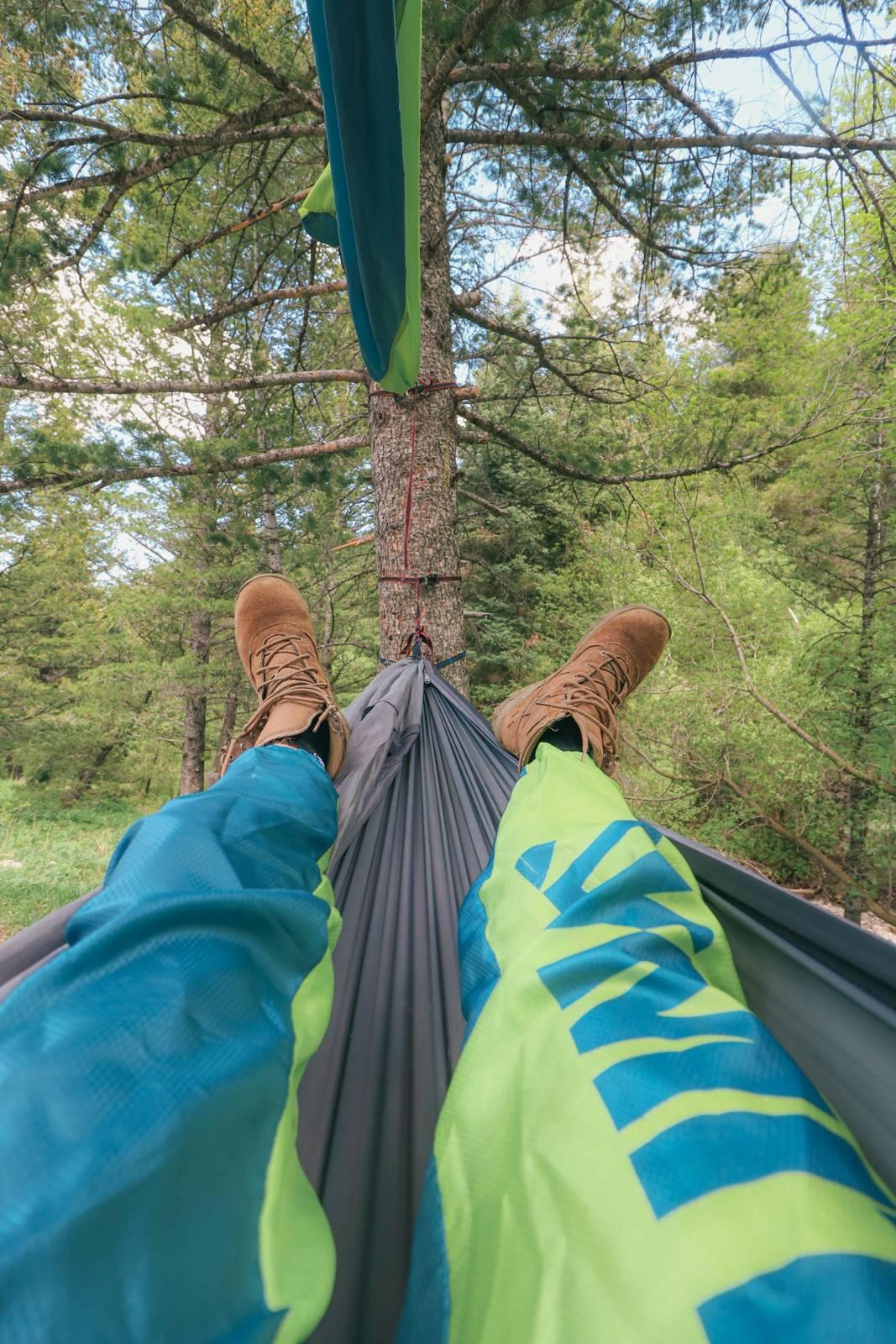 Relaxing in a hammock amidst the trees
