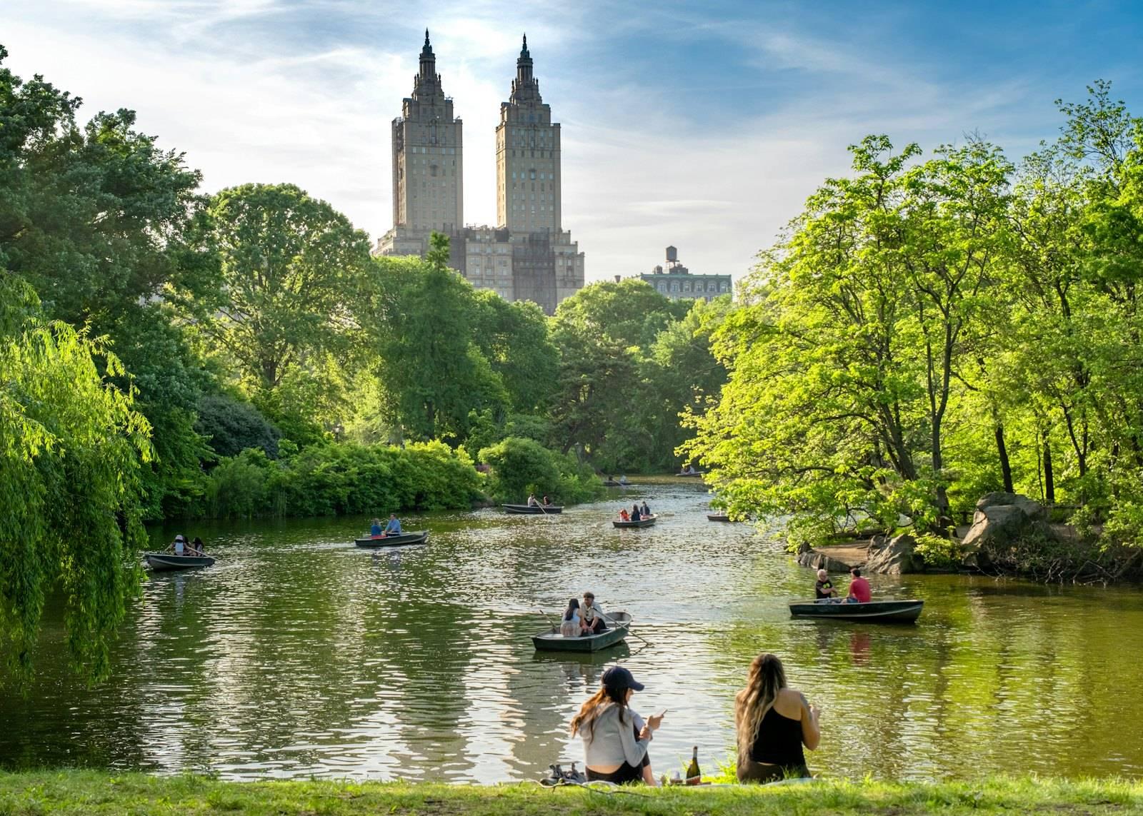 A group of people on small boats on a river
